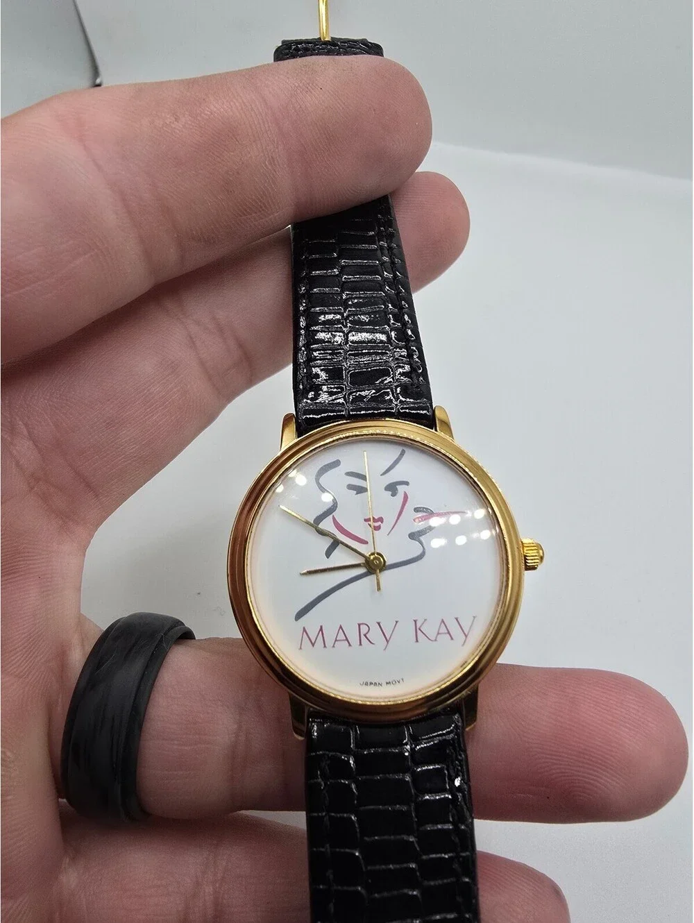 Mary Kay Women’s Quartz Analog Watch White Dial Gold Tone Steel Black Leather